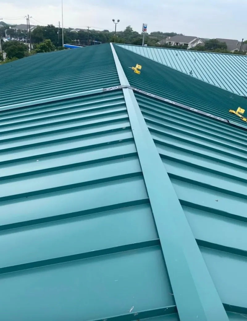 Green commercial metal roof ridge and valley for Metal Roof Repair in Rotonda